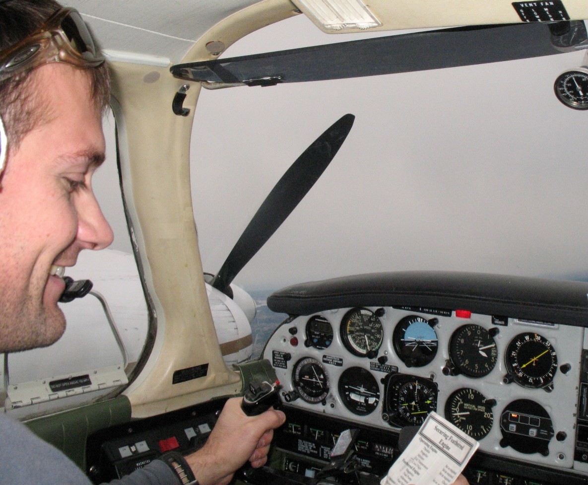 Alex Tremblay during an engine shut-down drill with Flight Instructor Philip Craig.  Langley Flying School.