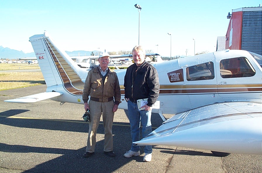 Glen Bell with Pilot Examiner Donn Richardson after the successful completion of Glen's Private Pilot Flight Test.  Langley Flying School