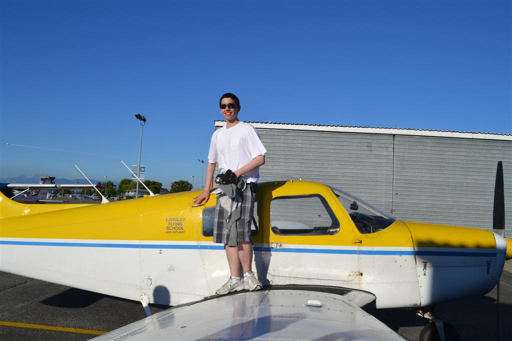 Jeff Priest on the wing of Cherokee GODP after the completion of his First Solo Flight on August 27, 2011. Langley Flying School.