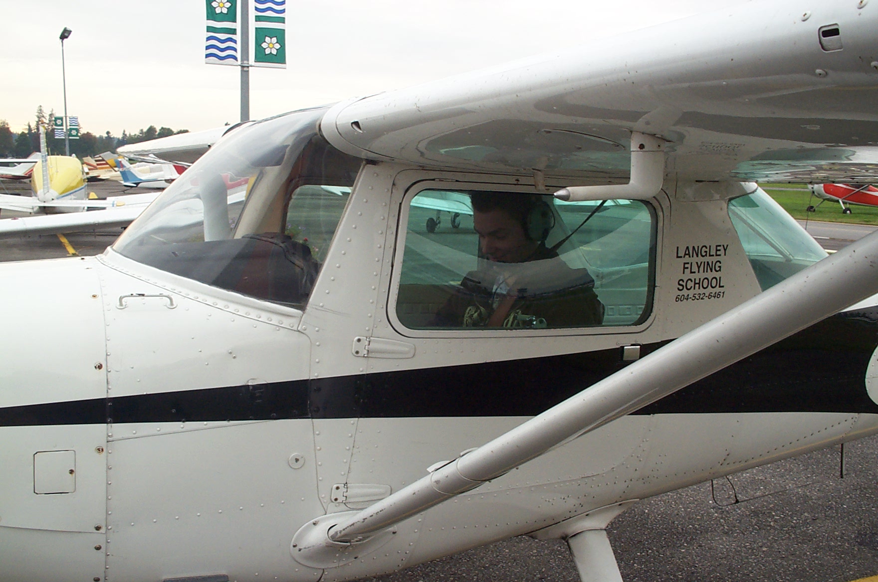 Kyle Rempel in the cockpit of Cessna GPUK.  Langley Flying School. 