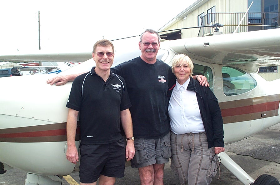 Peter McCreath with Flight Instructor Peter Waddington and Pilot Examiner Karen Douglas after the successful completion of Peter's Private Pilot Flight Test on June 23, 2008.  Langley Flying School.