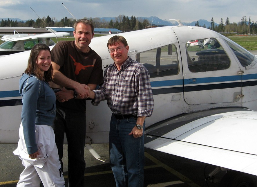 Steve Gallagher with Flight Instructor Naomi Jones and Pilot Examiner John Laing after the successful completion of Steve's Private Pilot Flight Test on April 20, 2008.  Langley Flying School.