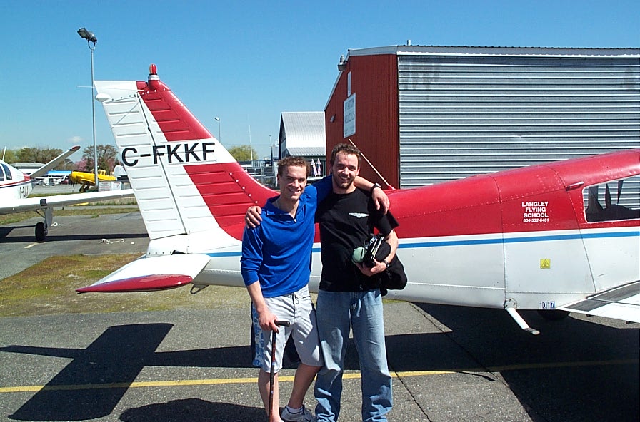 Steve Marsh with Flight Instructor Ryan Gahan after the successful completion of Steve's Private Pilot Flight Test.  Langley Flying School.