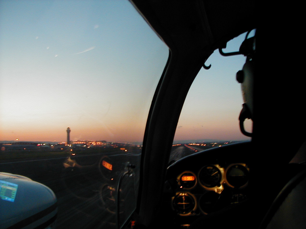 A twilight departure from Portland International Airport.  Langley Flying School.