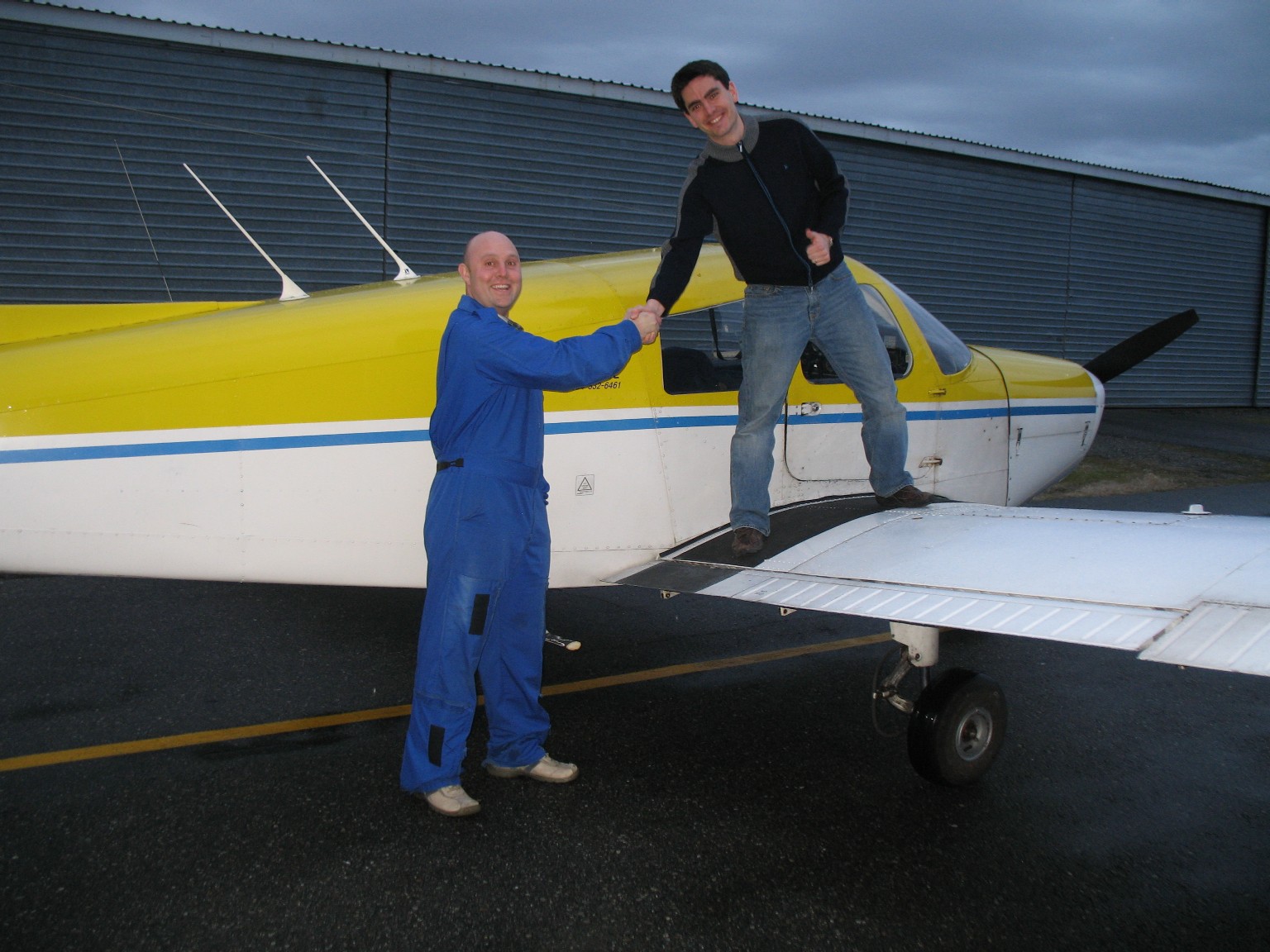 Jonathan King receives congratulations from his Flight Instructor, Rod Giesbrecht, after the completion of Jon's First Solo Flight on January 25, 2009 in Cherokee GODP.  Langley Flying School.